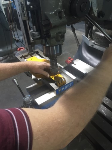 I'm an electrical engineer and dont get to mess around in the machine shop very often.  I measured the counter sink depth and had one of our techs drill a few while I took this picture.  I basically drilled this 20 dollar chassis out on a 150k+ drill press.
