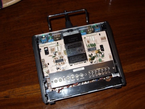 This was the look of the transmitter after I unsoldered the wires between the board and the control switches on top of the transmitter. Rather clean design.