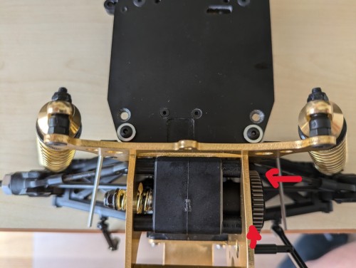 Build according manual - slipper pad pushes against chassis