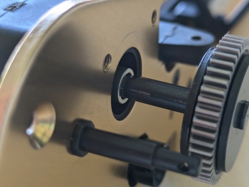 Second spacer on spur gear axle going too far in or is too short.