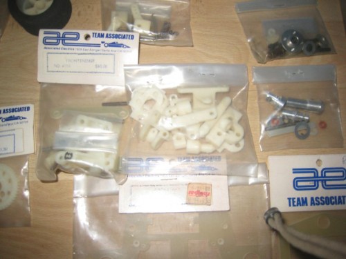 On the left is the Rc12i front suspension pieces, on the right is the rc12is front end conversion. I thought was very kind of the seller to throw in all these extras!