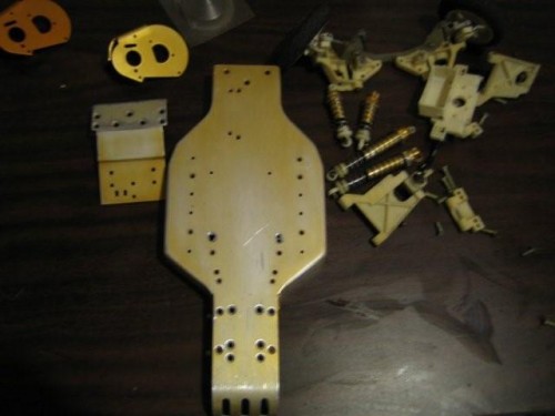 Box of parts. The shocks have the solid spring retainers.