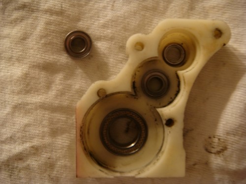 with top bearing out and what looks like a washer inside the hole