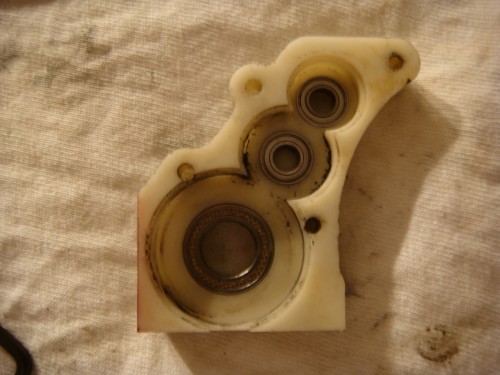 OK that was the first thing I noticed. Now for the good one. When I started to take the bearings out of the two transmission halves, the half where the drive gear/shaft assembly comes out of had what looks like a small washer. I'm really lost here. Is that done on purpose or is it left overs from a bearing that failed in the past.<br /><br /><br />with all bearing installed