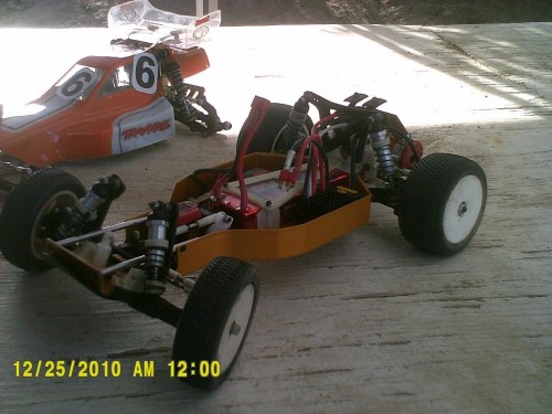 RC10 with TCP in the back ground
