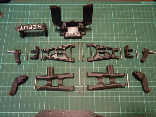 Bits and pieces will get a bit more of a clean prior to reassembly.  I might get either some RPM front arms to match the rear or otherwise some Losi Swept arms.  Any recommendations?