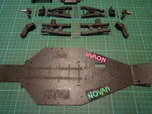 Top surface is not too bad.  I managed to get most of the residue left by the velcro and CA glue.  I will see what I can do with it when I fix the under side.  Do you think it's worth the effort to make it pretty if I'm going to run it?