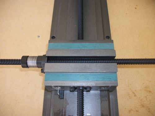 Table lead screw with the nut pre-loaded