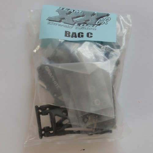 Bag C: Rear suspension with MIP driveshafts, graphite tower and wishbones but not pivot plate, interestingly. I might need to add one I think, the exploded view lists it as graphite.
