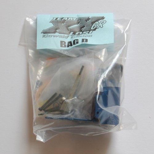 Bag D: Gearbox with ally layshaft &amp; gear and the iconic blue motor plate. Dual disk slipper too, complete with blue nut!