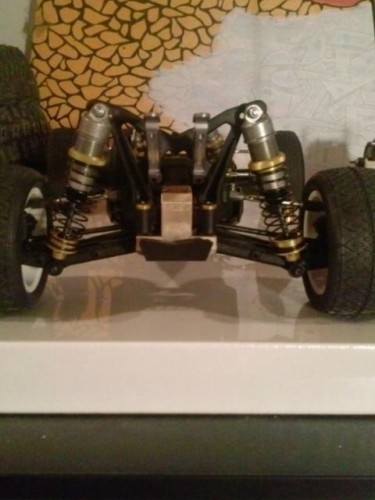 Added the brass weights....a couple gold washers...the yellow bits on the shocks n a gunmetal wing mount....